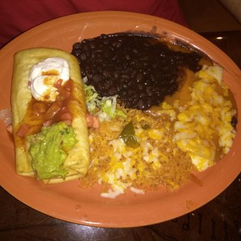 Mi Tierra - Beef chimichanga, cheese enchilada, black beans and rice.  Black beans had lots of flavor - Mexican Near Me - Lincoln, Nebraska