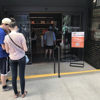 Amazon Go - These people are waiting for their phone to download the app. Don't be those people. - Convenience Stores Near Me - Seattle, Washington