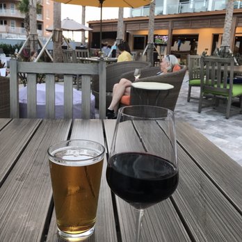 Oceanview Terrace Bar and Grill - a glass of wine and a glass of beer - Bars Near Me - Daytona Beach, Florida