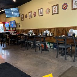 Inside dining watching football.