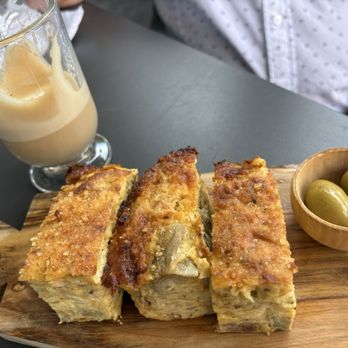 Cafe Borrone - Breakfast  Italian torta, w olives on a plank. Tasty! - Breakfast & Brunch Near Me - Menlo Park, California