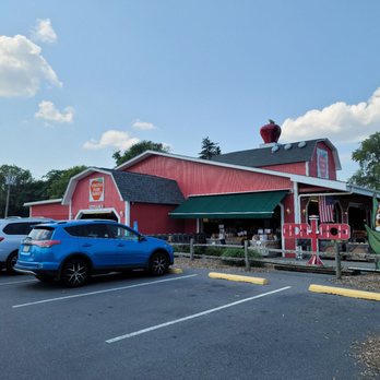 Virginia Farm Market - a blue car parked in front of a red barn - Farmers Market Near Me - Winchester, Virginia Virginia Farm Market - a blue car parked in front of a red barn - Farmers Market Near Me - Winchester, Virginia