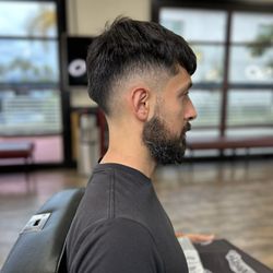 Moose's Barber Shop and Shave - Mid-high drop fade