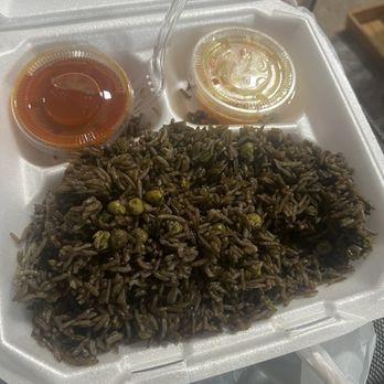 Saudie's Restaurant - Side of rice , picklez, and sauce - Haitian Near Me - Orlando, Florida