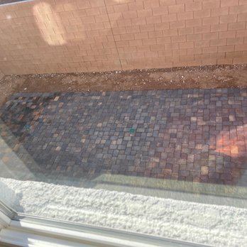 Alfaro Lawn Care - Photo of our new patio pavers-Drainage pipes were carefully accounted for in the process - Lawn Services Near Me - Las Vegas, Nevada Alfaro Lawn Care - Photo of our new patio pavers-Drainage pipes were carefully accounted for in the process - Lawn Services Near Me - Las Vegas, Nevada