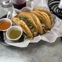 Taqueria San Jose - 3 tacos de res(beef),  2 tacos de pollo(chicken)  literally walking by on rainy day  Food and sauces were amazing 10/10 on this visit