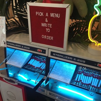 Red Poke - Ultraviolet sanitation for menus and pens - Korean Near Me - New York, New York