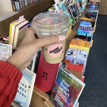 Reading in Public Bookstore + Cafe - Iced vanilla latte with oat milk - Bookstores Near Me - West Des Moines, Iowa Reading in Public Bookstore + Cafe - Iced vanilla latte with oat milk - Bookstores Near Me - West Des Moines, Iowa