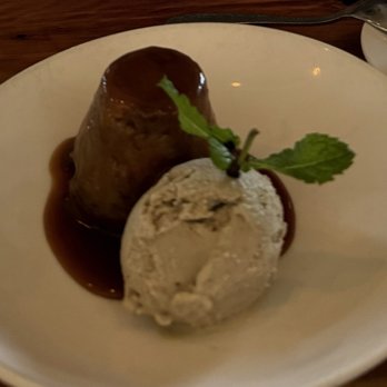 Passionfish - Maple-Banana Bread Pudding with Banana ice cream. Mint leaf not included but was placed by our toddler - Seafood Near Me - Pacific Grove, California