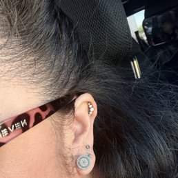 Helix and 3rd Ear piercing on ear lobe Helix and 3rd Ear piercing on ear lobe