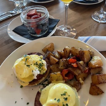 Willow Room - Eggs Benedict, Side of Fruit, Passionfruit mimosa - Wine Bars Near Me - Chicago, Illinois Willow Room - Eggs Benedict, Side of Fruit, Passionfruit mimosa - Wine Bars Near Me - Chicago, Illinois