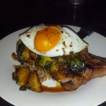 Flying Pig Pub & Kitchen - Pork Chop with fried egg, carmalized Brussels Sprouts and Fara. Sooo delicious! Nice hip atmosphere, great server & service. - Pubs Near Me - Oceanside, California Flying Pig Pub & Kitchen - Pork Chop with fried egg, carmalized Brussels Sprouts and Fara. Sooo delicious! Nice hip atmosphere, great server & service. - Pubs Near Me - Oceanside, California