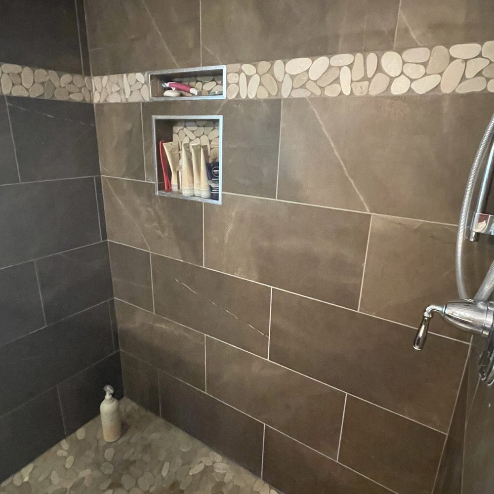 More of master bathroom shower. More of master bathroom shower.