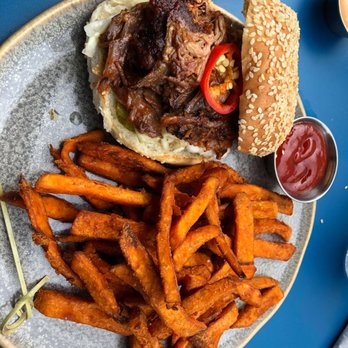 Banter - Pulled pork sandwich with sweet fries [perfectly cooked and seasoned] $16 was super tender and yummy - Breakfast & Brunch Near Me - New York, New York
