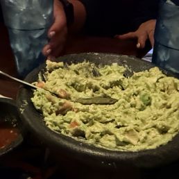 Guac made at the table Guac made at the table