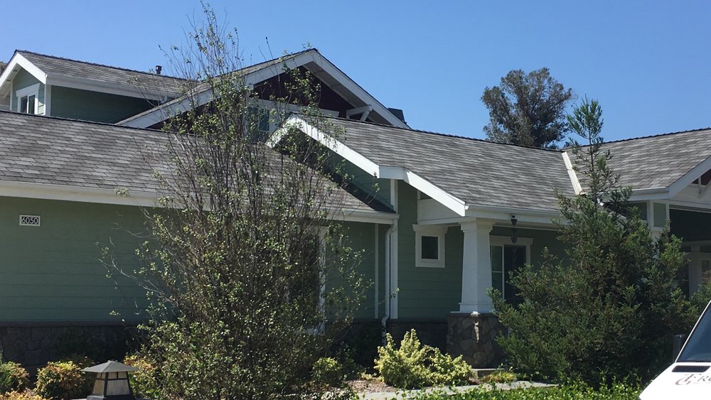 Slide of TG Roofing and Roof Removal