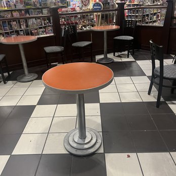 Starbucks - a table and chairs in a coffee shop - Coffee & Tea Near Me - Humble, Texas