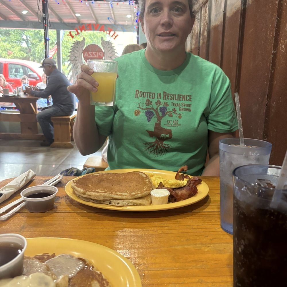 Texas Sunrise - The buttermilk breakfast plate with scammed eggs and bacon. And a mimosa - Breakfast & Brunch Near Me - Fredericksburg, Texas Texas Sunrise - The buttermilk breakfast plate with scammed eggs and bacon. And a mimosa - Breakfast & Brunch Near Me - Fredericksburg, Texas