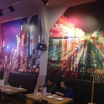 GoBistro - Scenes from Tokyo on the walls - Sushi Bars Near Me - Hollywood, Florida