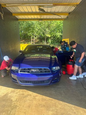Full-Service Hand Car Wash! - At Ale's Car Wash, we’re passionate about keeping your vehicle looking its best. Our hand car wash services provide a thorough and gentle clean that ensures every nook and cranny is addressed without compromising your car’s clear coat. Whether you drive a compact sedan, a rugged SUV, or a sleek sports car, we’ve got you covered! Professional Care: Our experienced team treats each vehicle with care, using the right techniques and quality products to achieve outstanding results. Attention to Detail: We pay attention to the smallest details, from the rims to the roof, ensuring a spotless finish every time. Eco-Friendly: We use environmentally friendly cleaning solutions that are tough on dirt but gentle on your car and the planet. Convenience: No appointment necessary! Swing by anytime during our business hours for a quick and efficient hand wash. Our Hand Car Wash Process: Find a Cool and Shady Spot: We wash your car in a shaded area to prevent water spots and make the process more comfortable for you. Rinse and Pre-Treat: We start by rinsing off loose dirt and pre-treating any heavy grime. Our foam cannon ensures thorough coverage. Gentle Wash: Our team gently washes your car section by section, paying special attention to areas like the grille, wheels, and door jambs. Hand Dry: We hand-dry your car using soft microfiber towels to avoid swirl marks. Visit Us Today! Drive in, relax, and let us take care of your car. Your ride deserves the best! Full-Service Hand Car Wash! - At Ale's Car Wash, we’re passionate about keeping your vehicle looking its best. Our hand car wash services provide a thorough and gentle clean that ensures every nook and cranny is addressed without compromising your car’s clear coat. Whether you drive a compact sedan, a rugged SUV, or a sleek sports car, we’ve got you covered! Professional Care: Our experienced team treats each vehicle with care, using the right techniques and quality products to achieve outstanding results. Attention to Detail: We pay attention to the smallest details, from the rims to the roof, ensuring a spotless finish every time. Eco-Friendly: We use environmentally friendly cleaning solutions that are tough on dirt but gentle on your car and the planet. Convenience: No appointment necessary! Swing by anytime during our business hours for a quick and efficient hand wash. Our Hand Car Wash Process: Find a Cool and Shady Spot: We wash your car in a shaded area to prevent water spots and make the process more comfortable for you. Rinse and Pre-Treat: We start by rinsing off loose dirt and pre-treating any heavy grime. Our foam cannon ensures thorough coverage. Gentle Wash: Our team gently washes your car section by section, paying special attention to areas like the grille, wheels, and door jambs. Hand Dry: We hand-dry your car using soft microfiber towels to avoid swirl marks. Visit Us Today! Drive in, relax, and let us take care of your car. Your ride deserves the best!