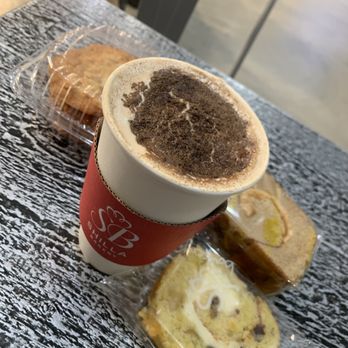 Shilla Bakery & Cafe - Tysons Corner - Pumpkin Spice Latte with Almond Cookies, Mocha Roll Cake Slice, and Mango Roll Cake Slice - Desserts Near Me - McLean, Virginia Shilla Bakery & Cafe - Tysons Corner - Pumpkin Spice Latte with Almond Cookies, Mocha Roll Cake Slice, and Mango Roll Cake Slice - Desserts Near Me - McLean, Virginia