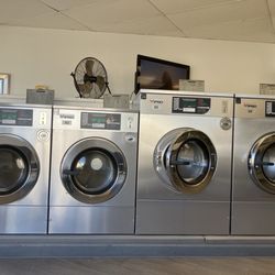Independence Laundry - This is just a few of their medium and smaller washers available. There are BIGGER ones further back in the place.