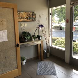 Priceless Dental Group - Lobby is very clean and comfortable. Beautiful orchids on display