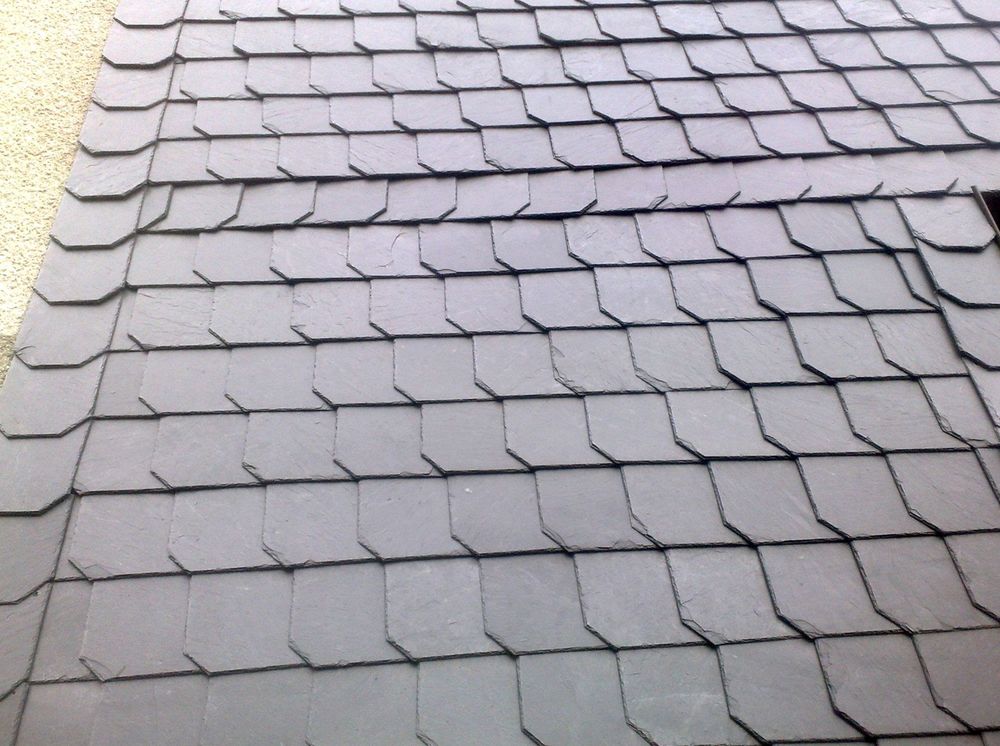 Slide of Arlanza Roofing