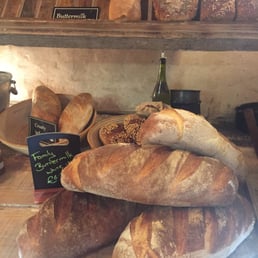 Freshly baked in house, selection of breads.