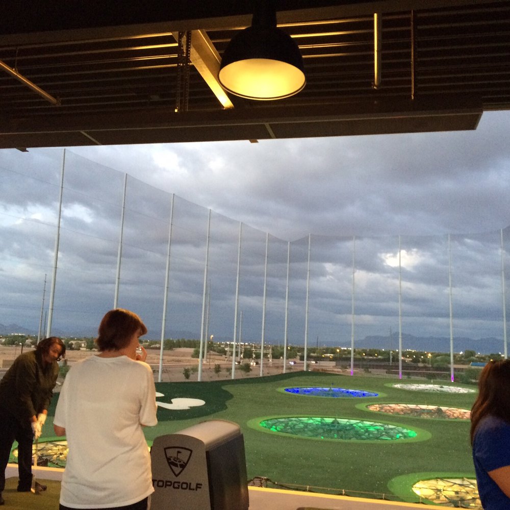 Topgolf - My boss in the white shirt... Man she is good at golf. She was driving the ball far! I finally found a sport that I suck at lol - Golf Near Me - Gilbert, Arizona Topgolf - My boss in the white shirt... Man she is good at golf. She was driving the ball far! I finally found a sport that I suck at lol - Golf Near Me - Gilbert, Arizona