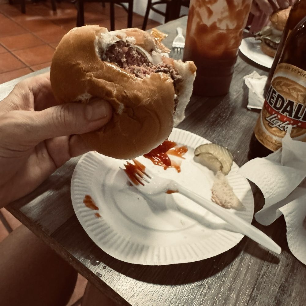 El Hamburguer - Hamburger medium with Rochefort cheese, fries, Medella beer inside the restaurant - Burgers Near Me - San Juan, Puerto Rico