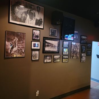 Tavern At The Creek - a wall full of pictures - Bars Near Me - Galena, Ohio