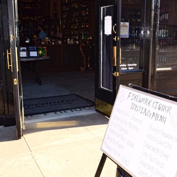 Firewater Liquor - a sign in front of a store - Beer, Wine & Spirits Near Me - Mart, Texas