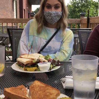 Baked - a woman wearing a face mask sitting at a table with a plate of food - Cafes Near Me - Shelburne Falls, Massachusetts Baked - a woman wearing a face mask sitting at a table with a plate of food - Cafes Near Me - Shelburne Falls, Massachusetts