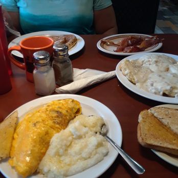 Debary Diner - Spanish omelette, grits, rye toast, coffee, biscuits and gravy, bacon, some kinda chocolate pancake. - Diners Near Me - Debary, Florida