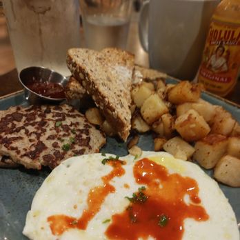 First Watch - The spread... 2 eggs over easy,chicken sausage,potatoes with onions and artisan toast - Breakfast & Brunch Near Me - Atlanta, Georgia First Watch - The spread... 2 eggs over easy,chicken sausage,potatoes with onions and artisan toast - Breakfast & Brunch Near Me - Atlanta, Georgia