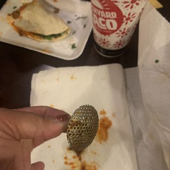 Backyard Taco - This is the metal piece i found in my birria quesadilla. - Tacos Near Me - Chandler, Arizona Backyard Taco - This is the metal piece i found in my birria quesadilla. - Tacos Near Me - Chandler, Arizona