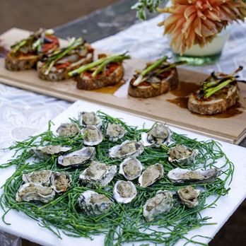 Encounter - Grilled oysters topped with foi grad. - Bike tours Near Me