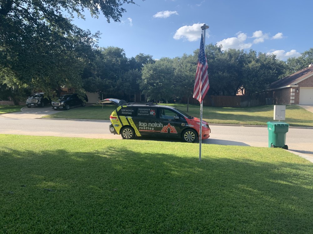 Slide of Top Notch Roofing