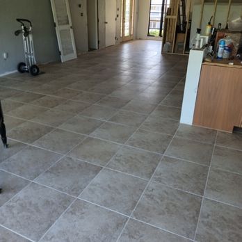 Young's Flooring Solutions - a kitchen and living room - Flooring Near Me Young's Flooring Solutions - a kitchen and living room - Flooring Near Me