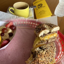 Sausage egg and cheese in everything bagel! Double shot cortado. Sausage egg and cheese in everything bagel! Double shot cortado.