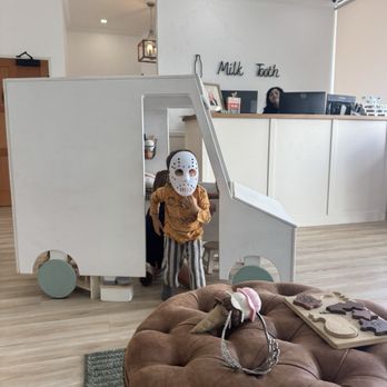 Milk Tooth Pediatric Dentistry and Wellness Shoppe - Don't mind my kid. He has no idea how creepy is being. He just likes the hockey mask. - Pediatric Dentists Near Me - Hermosa Beach, California