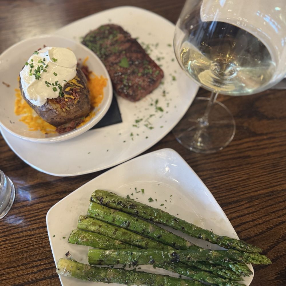 Manning's Steaks and Spirits - Strip Steak, Loaded Bake Potato and Asparagus - Steakhouses Near Me - Lakewood, Colorado Manning's Steaks and Spirits - Strip Steak, Loaded Bake Potato and Asparagus - Steakhouses Near Me - Lakewood, Colorado