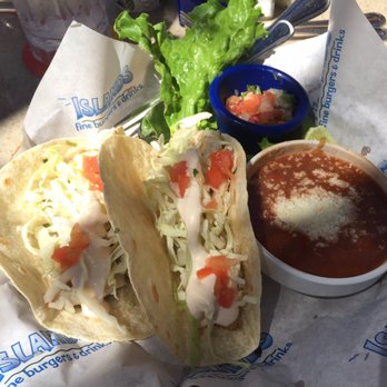 Islands Restaurant - Mahi Mahi Tacos. Don't waste your money on this. It wasn't good. This looks like something you get at Taco Bell. - Burgers Near Me - Manhattan Beach, California Islands Restaurant - Mahi Mahi Tacos. Don't waste your money on this. It wasn't good. This looks like something you get at Taco Bell. - Burgers Near Me - Manhattan Beach, California