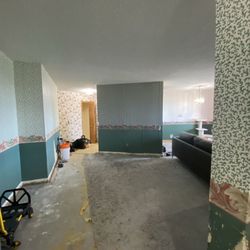 To Do Done - Before. Carpet removed, wallpaper in place.