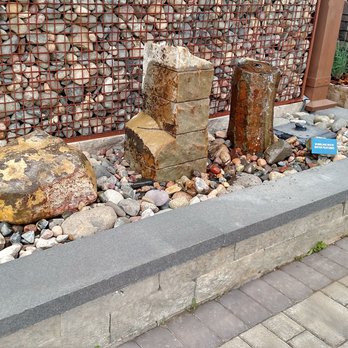 SiteOne Landscape Supply - a stone fountain in a garden - Landscaping Near Me - Plymouth, Minnesota SiteOne Landscape Supply - a stone fountain in a garden - Landscaping Near Me - Plymouth, Minnesota