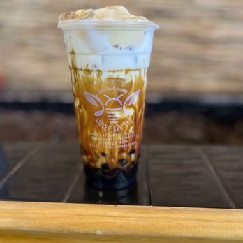 Honey Bee Tea - a cold drink in a plastic cup - Bubble Tea Near Me - Manchester, Missouri