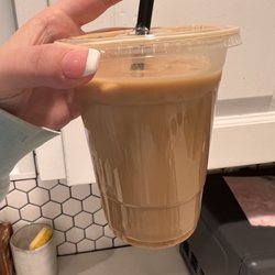 Ravensara Espresso - Warm iced americano with no ice and burnt shots