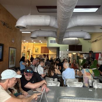 Café Manolín - Lunch crowd from the counter - Caribbean Near Me - San Juan, Puerto Rico Café Manolín - Lunch crowd from the counter - Caribbean Near Me - San Juan, Puerto Rico