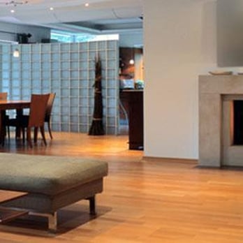 Ramco Floor & Tile - a living room with a fireplace - Flooring Near Me - Kelowna, British Columbia Ramco Floor & Tile - a living room with a fireplace - Flooring Near Me - Kelowna, British Columbia